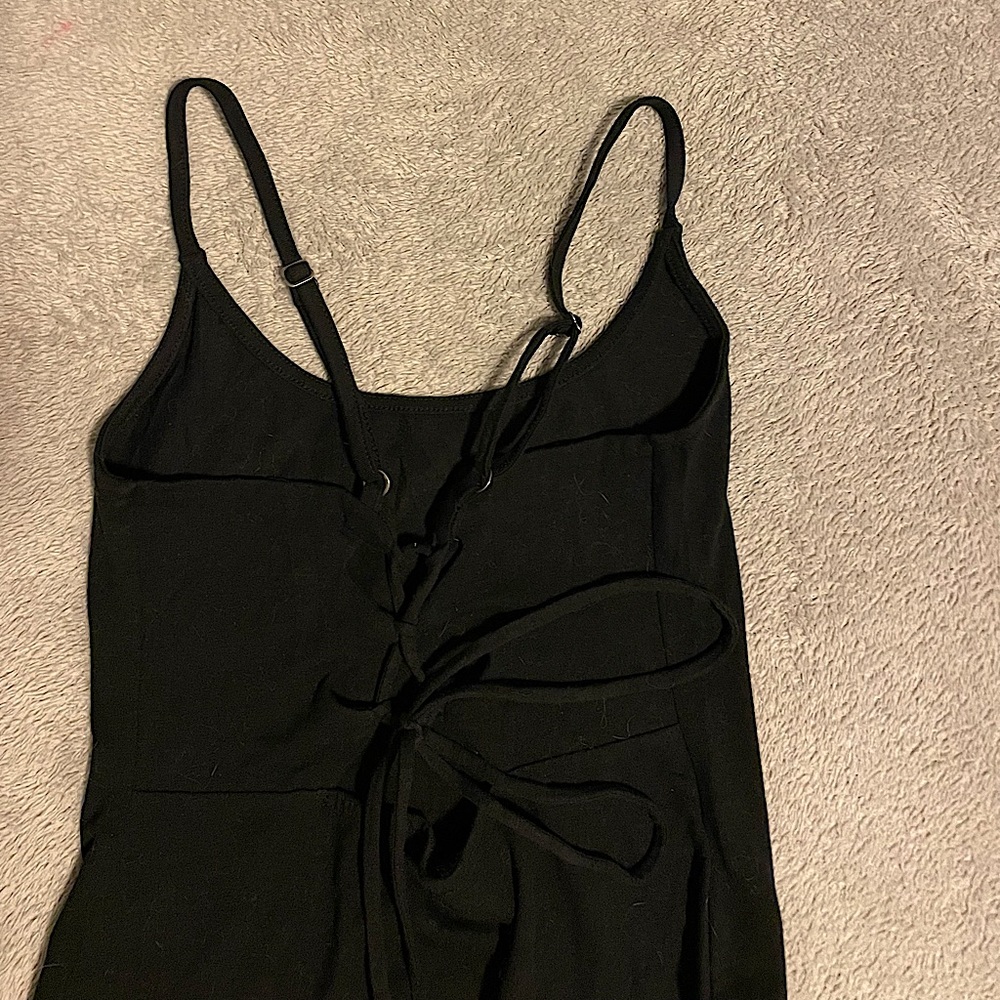 black lace up bodysuit!! 
size: XS
condition: like new